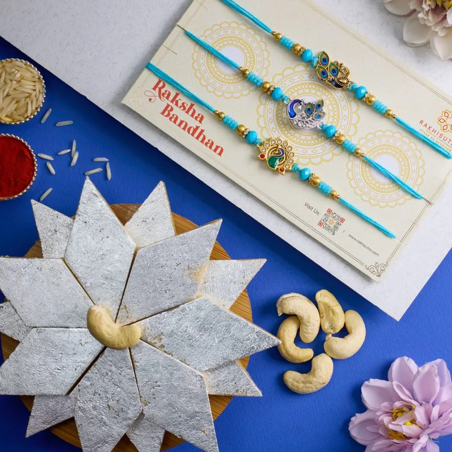 Stunning Peacock Rakhi Set N Kaju Katli Combo