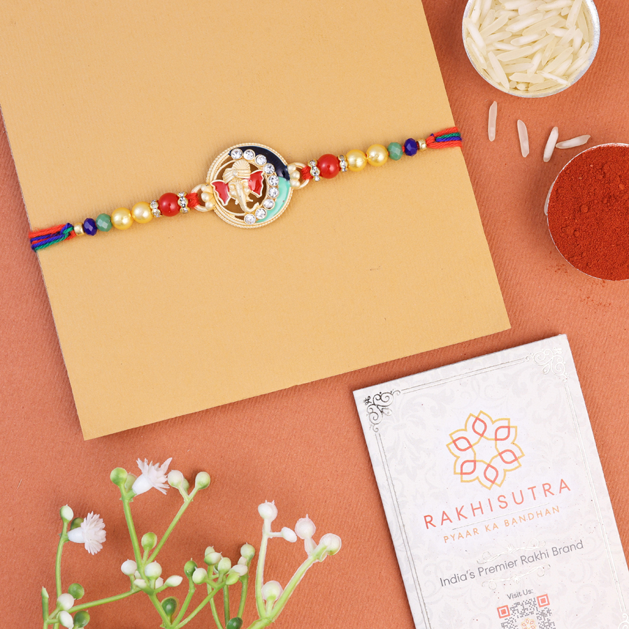 Auspicious Ganesh Rakhi gift set with traditional items