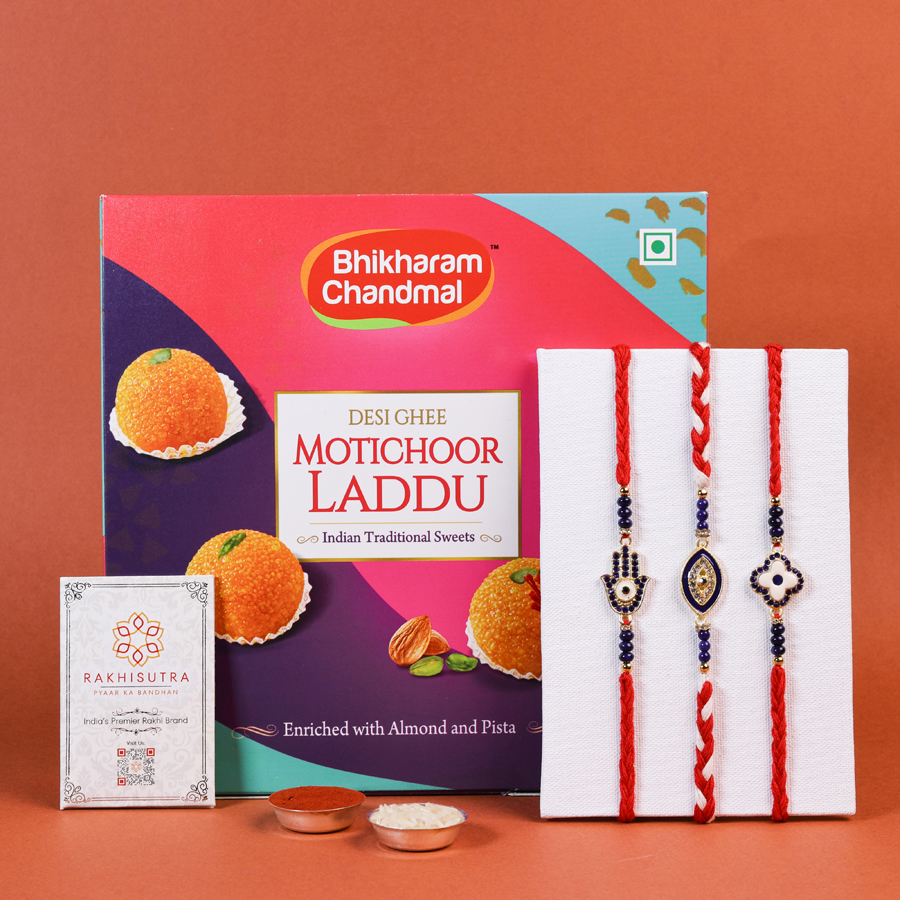Charming Rakhi gift set with Evil Eye and sweets