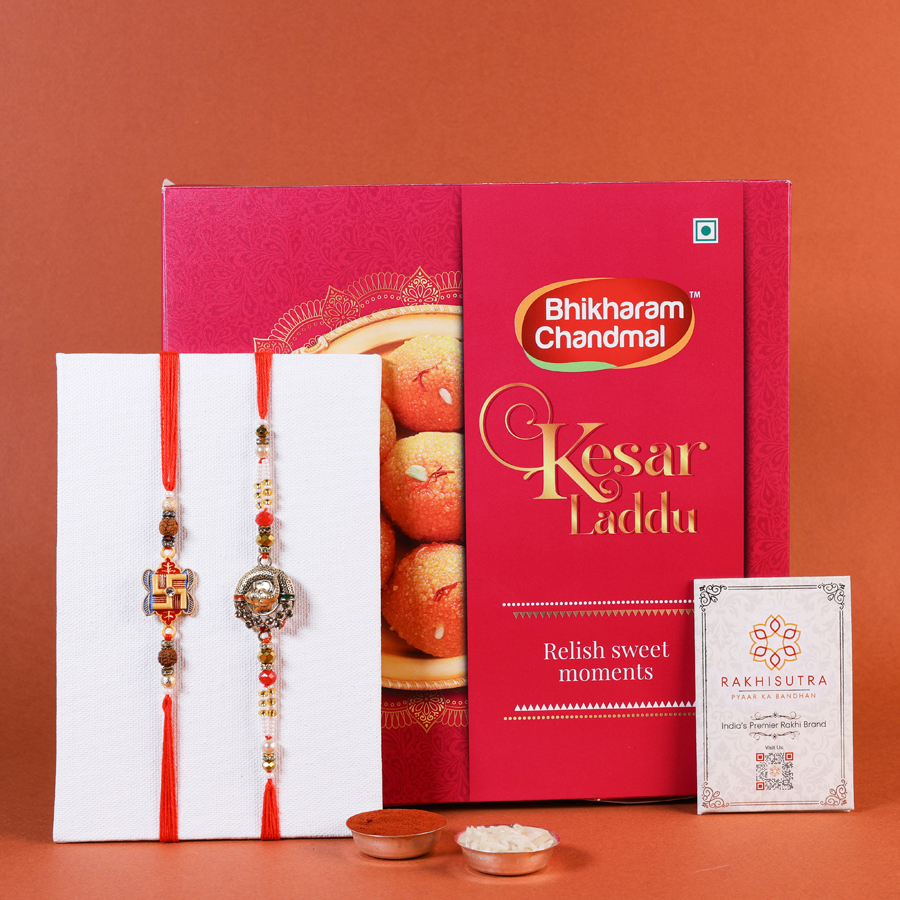 Festive Rakhi gift set with Rakhis, sweets, and a message card