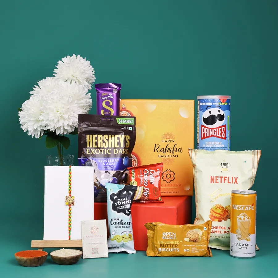 Stylish Rakhi and gourmet gift box with snacks