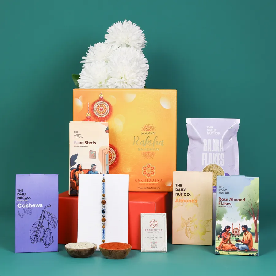 Elegant Evil Eye Rakhi and snack assortment